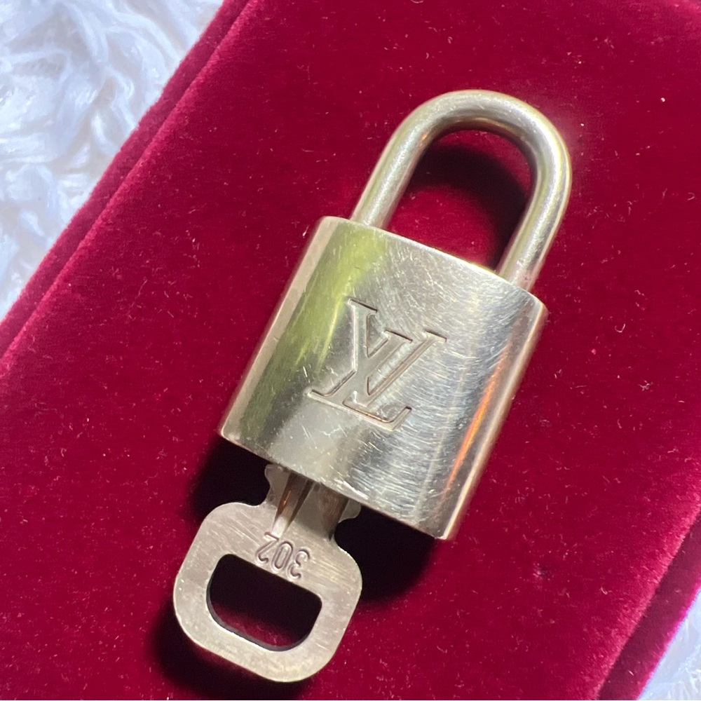 Louis Vuitton Gold Padlock with Key